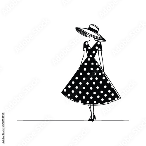 woman wearing retro fashion polka dot midi dress with a wide brimmed hat