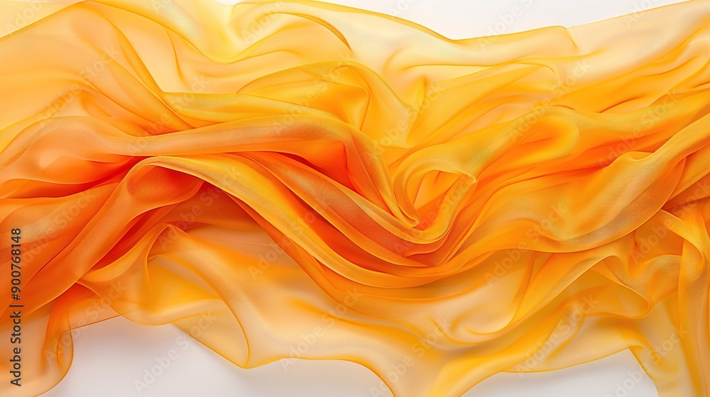 Close-up image of orange and yellow fabric on white paper Close-up image of orange and yellow fabric on white paper