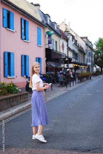 Photography travel guide, tourism in Europe, woman tourist on the street Roissy en France