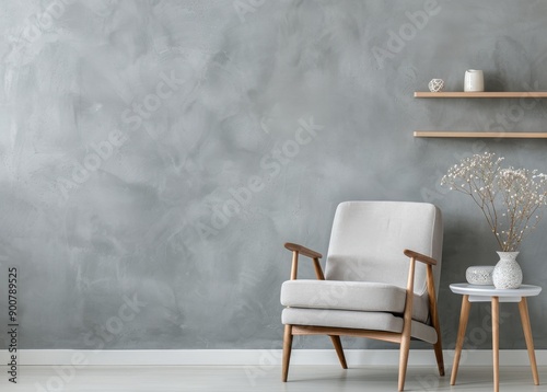 Grey Wall With Armchair and Side Table