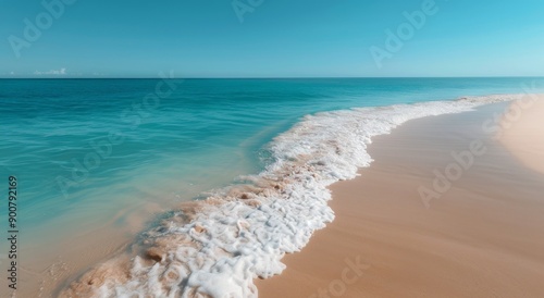 Turquoise Waves Crashing on Sandy Beach