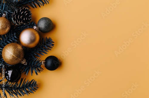 Christmas Ornaments and Pine Branches on Yellow Background