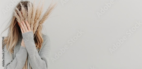 Woman Holding Pampas Grass