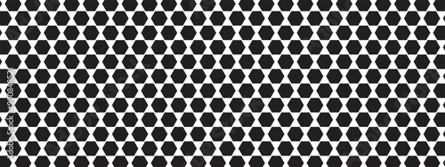 Repeated black hexagone shapes on white background. Perforated surface with honeycomb holes. Bee hive texture. Peg board, radiator or speaker grid. Mosaic wall or floor pattern. Vector illustration