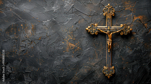 An intricately designed crucifix is mounted against a stark, textured dark wall