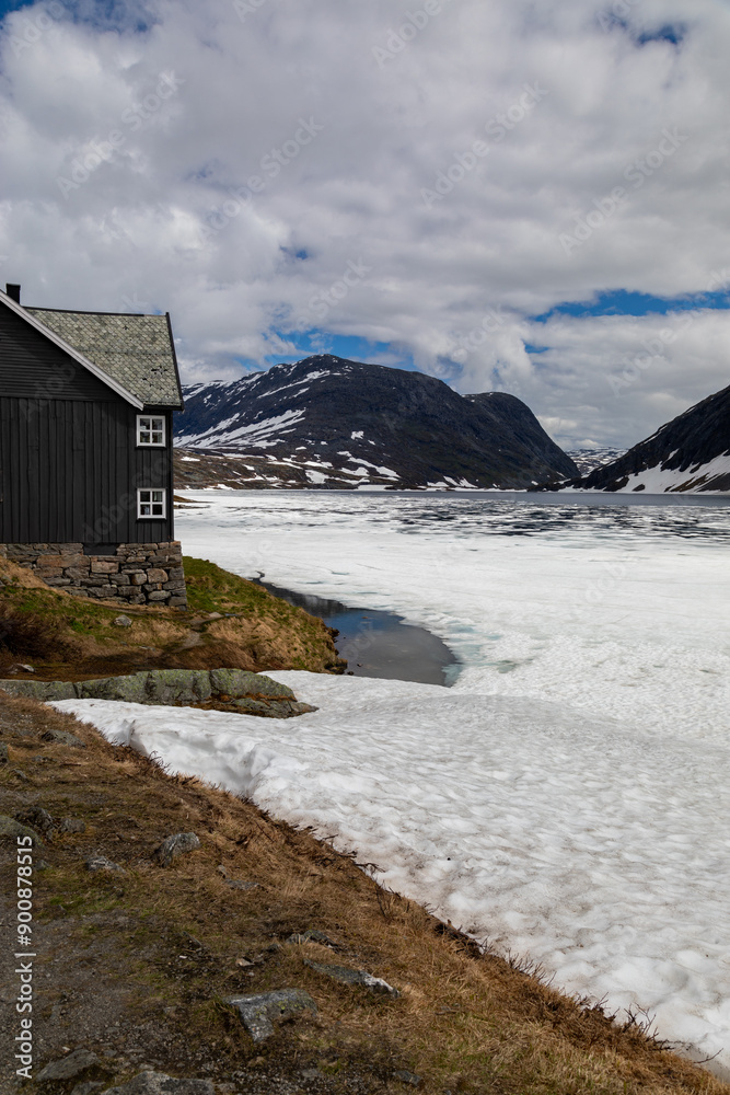 Djupvatnet Lake High Above Geiranger Fjord Norway Still Frozen Over in Midsummer, View from the Hotel Djupvatnet Lake High Above Geiranger Fjord Norway Still Frozen Over in Midsummer, View from the Hotel