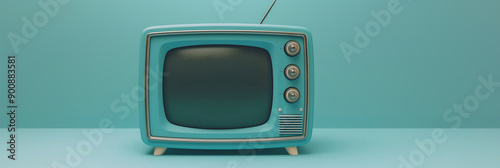 Vintage television set standing on turquoise background photo