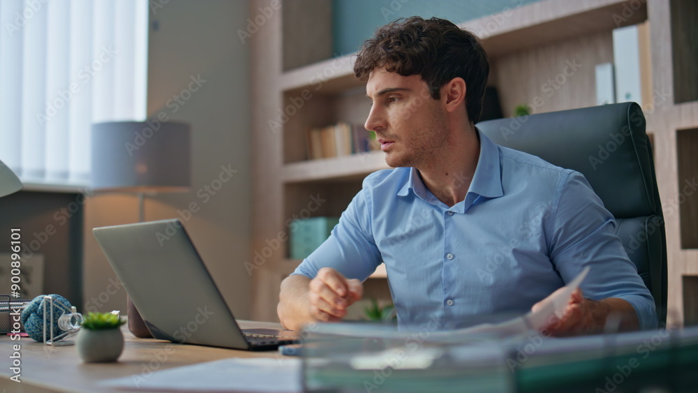 Joyful employee celebrating promotion email in office. Closeup man rejoicing Joyful employee celebrating promotion email in office. Closeup man rejoicing