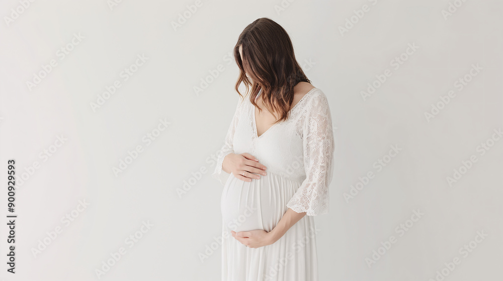 Pregnant Woman in White Dress Holding Belly on Minimalist Background Pregnant Woman in White Dress Holding Belly on Minimalist Background