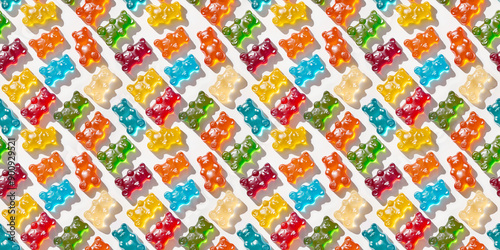 colorful gummy bear candy pattern, flat lay photography, top view, simple white background, low contrast