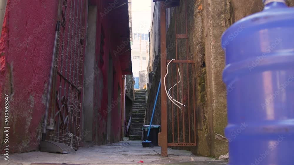Favela stairs, huge bottle of water, broom, lose wires, slums of Sao Paulo, Brazil. Favela stairs, huge bottle of water, broom, lose wires, slums of Sao Paulo, Brazil.