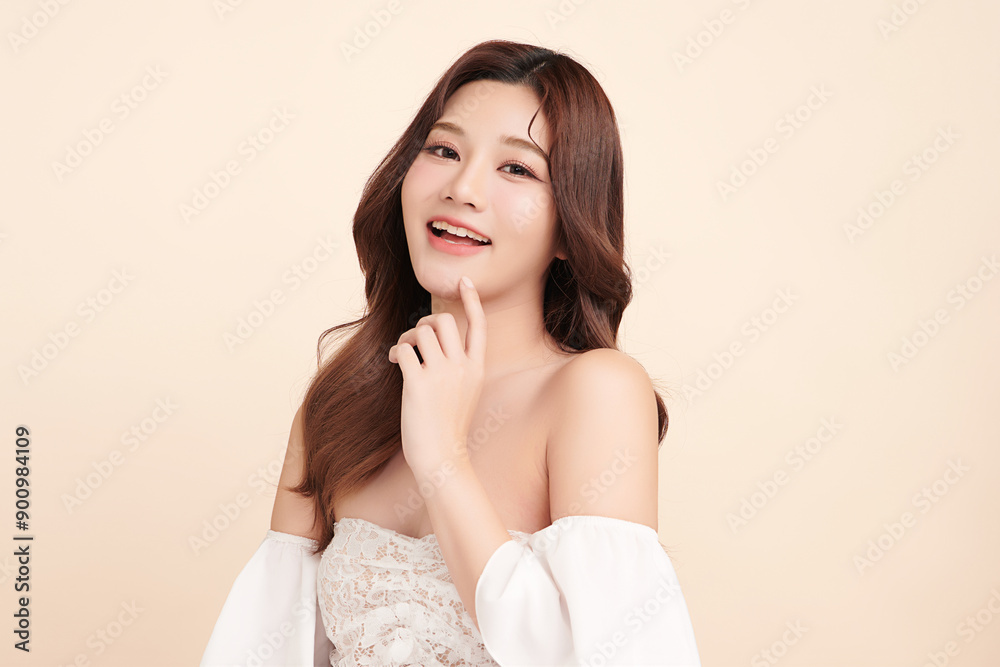 Beautiful young asian woman with clean fresh skin on beige background, Face care, Facial treatment, Cosmetology, beauty and spa, Asian women portrait. Beautiful young asian woman with clean fresh skin on beige background, Face care, Facial treatment, Cosmetology, beauty and spa, Asian women portrait.