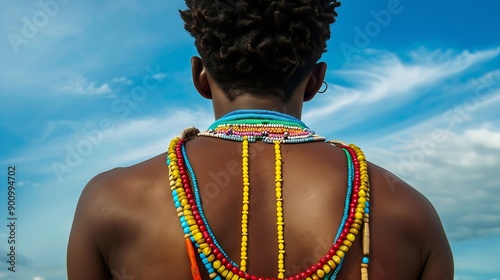 Black man with his back turned with a colorful Umbanda and Candombl religious necklace AfroBrazilian religion African religion Ax Orix Orixs : Generative AI photo