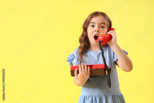 Shocked little girl with re...