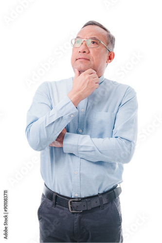 Asia man in a blue shirt and gray pants is looking to the right. He is wearing glasses and has his arms crossed