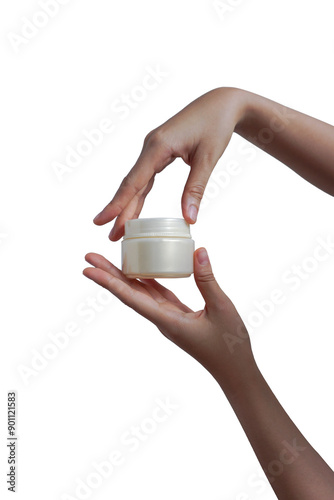 Female hands holds cream jar for cosmetics. Packaging for cream, gel, serum, advertising and product promotion, mock up           
