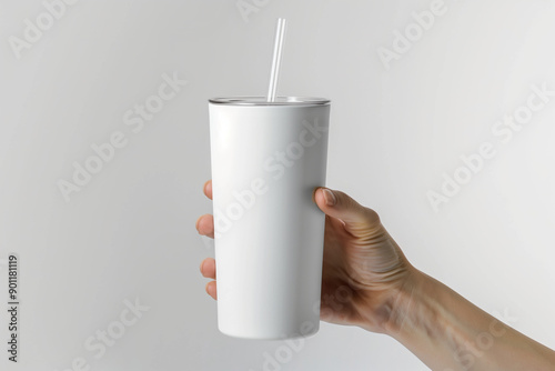 Modern White Skinny Tumbler Mockup Held by Hand in Well-Lit Studio Setting for Product Photography