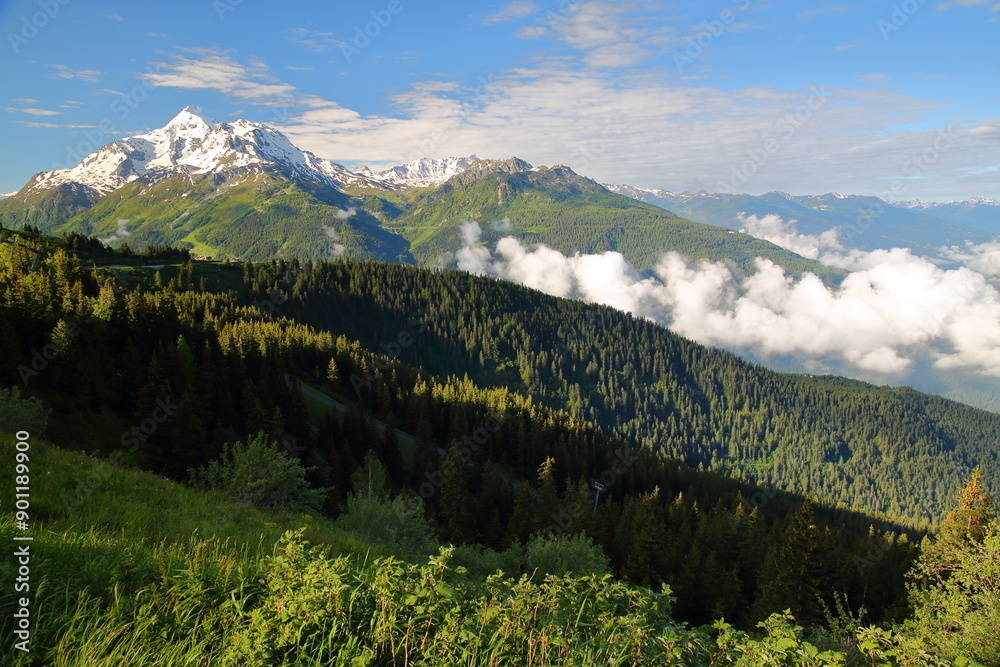 La Rosiere (Ski resort) overlooking the valley towards Bourg Saint Maurice, Northern French Alps, Savoie, France, with mountain peaks (Mont Pourri) and morning clouds