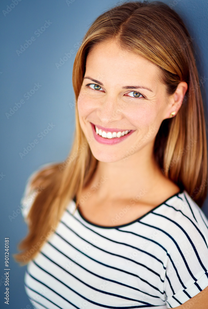 Woman, smile and portrait in studio with fashion, confidence and pride with edgy style by blue background. Excited person, model and happy with clothes, tshirt and trendy outfit in New Zealand Woman, smile and portrait in studio with fashion, confidence and pride with edgy style by blue background. Excited person, model and happy with clothes, tshirt and trendy outfit in New Zealand