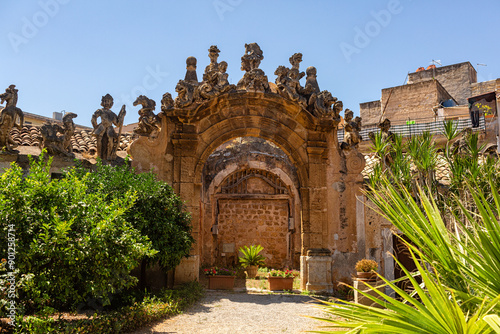 Obraz na plátně The wall of Villa Palagonia, The beautiful Villa decorated with famous grotesques statues of monsters with human faces, Bagheria, near Palermo city
