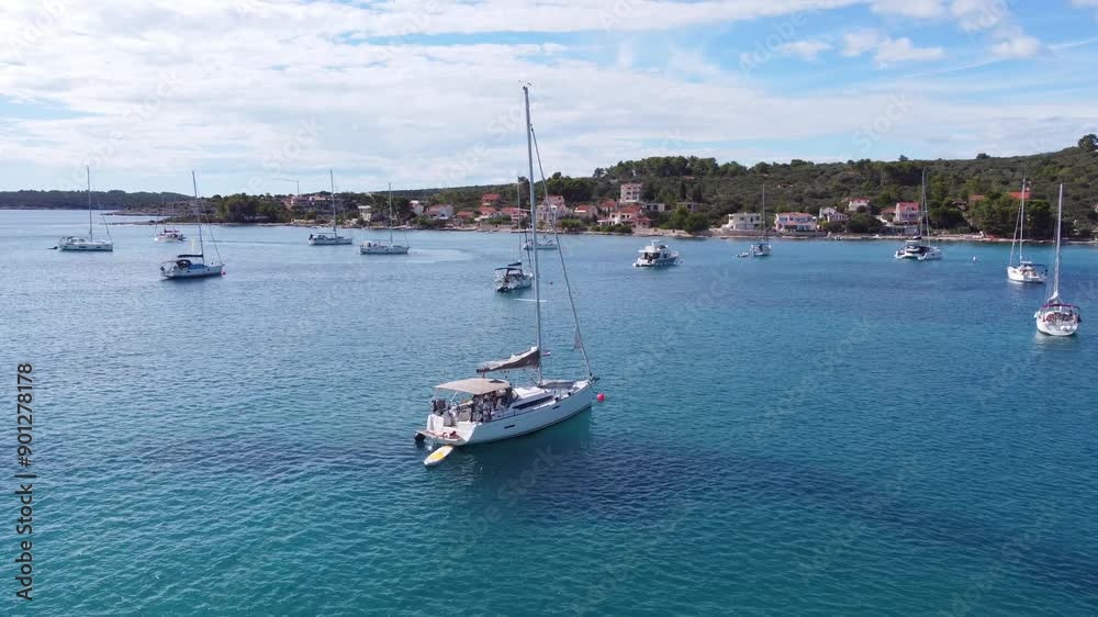 Drone view of yachts moored on buoys near the shore in the bay of Uvala Gradina near the town of Vela Luka on the island of Korcula in Croatia Drone view of yachts moored on buoys near the shore in the bay of Uvala Gradina near the town of Vela Luka on the island of Korcula in Croatia