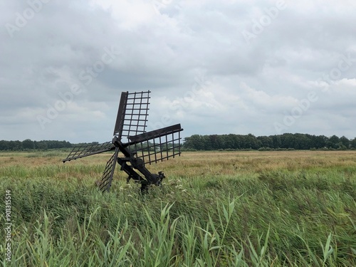 A wind-powered tjasker formerly used to irrigate the reed fields in Feanwalden, Friesland, the Netherlands. photo