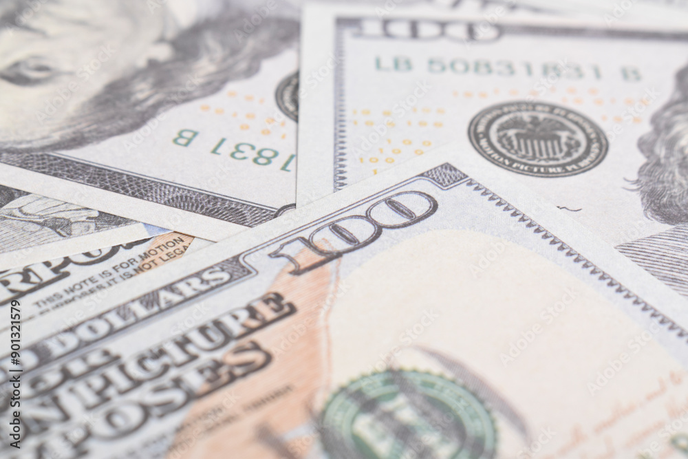 Background of US dollar bills. Selective focus. American vintage money cash, hundred dollar bills. Texture US dollars Background of US dollar bills. Selective focus. American vintage money cash, hundred dollar bills. Texture US dollars