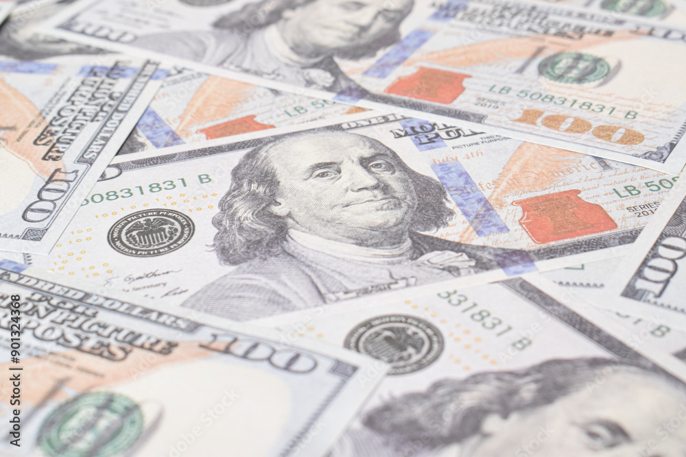 Background of US dollar bills. Selective focus. American vintage money cash, hundred dollar bills. Texture US dollars Background of US dollar bills. Selective focus. American vintage money cash, hundred dollar bills. Texture US dollars
