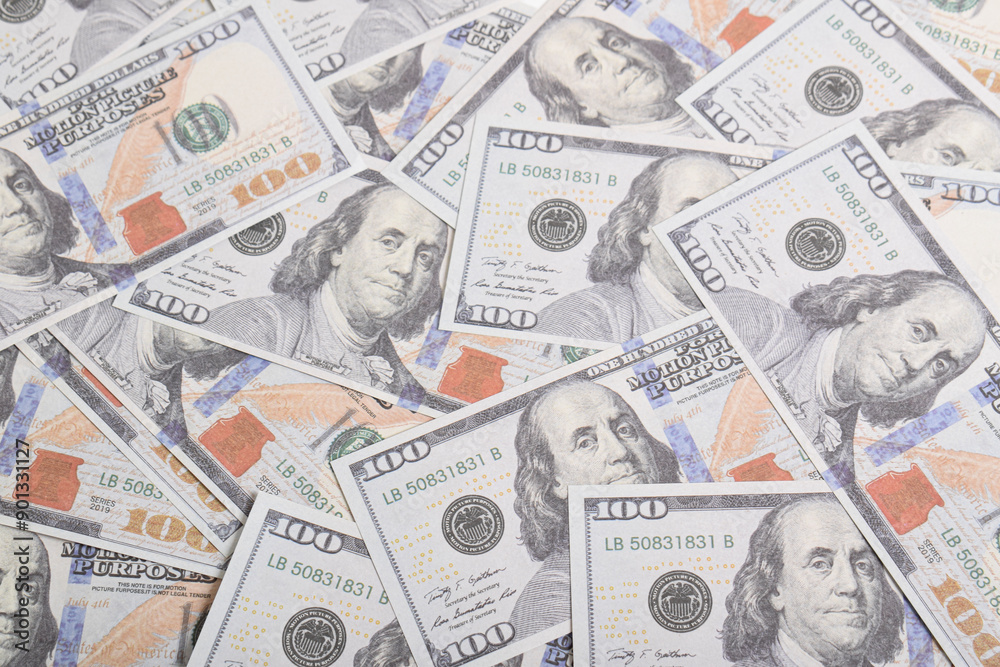 Background of US dollar bills. Top view. American vintage money cash, hundred dollar bills. Texture US dollars Background of US dollar bills. Top view. American vintage money cash, hundred dollar bills. Texture US dollars
