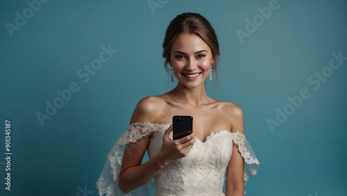 Bride holding phone, smiling against a blue background.