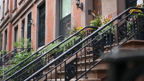 New York City townhouse building, Brooklyn Heights residential district, USA. Brownstone urban architecture, attached house. United States real estate, american property, apartments and homes in NYC.
