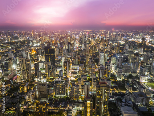 Aerial view Bangkok City skyline and skyscraper on Sathorn Road business and financial in Bangkok downtown. Bangkok cityscape in sunset time, Thailand. 