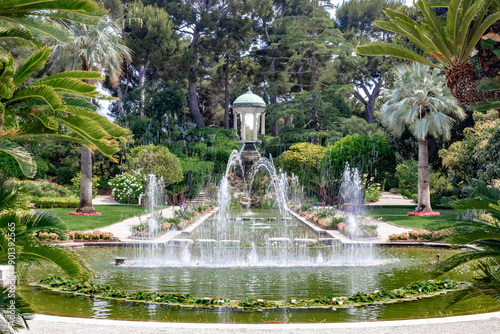 A beautiful garden fountain of Villa Ephrussi de Rothschild in a sunny day