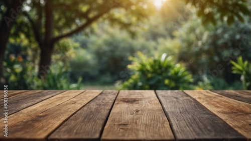 The empty wooden table with blur summer background.