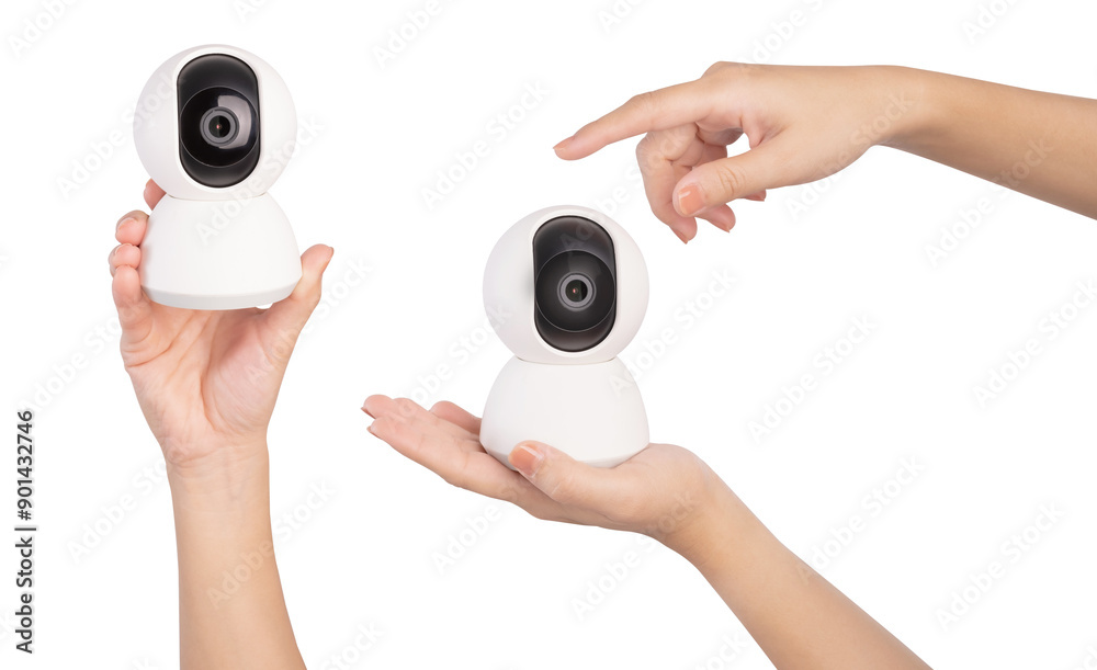 Fototapeta premium Hand hold wireless security camera on white background.