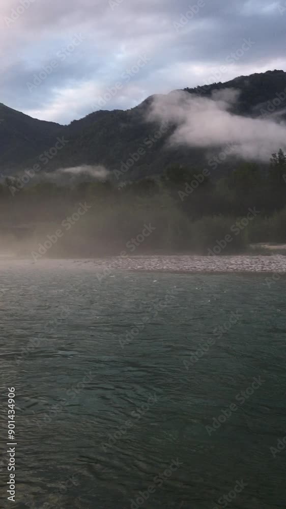 Beautiful Panoramic View of Isonzo River at the Sunset during a Sunny Summer Day. Tolmin, Slovenia Beautiful Panoramic View of Isonzo River at the Sunset during a Sunny Summer Day. Tolmin, Slovenia