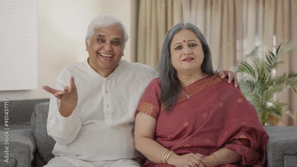 Happy Old Indian couple talking to the camera Happy Old Indian couple talking to the camera