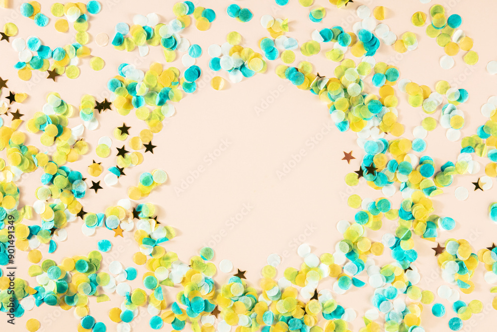 Obraz premium Happy birthday or any holiday festive background with confetti and copy space. Carnival greeting card with golden stars, on a pink background