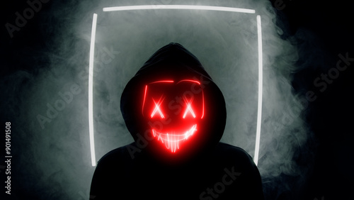 Silhouette of a man in a neon mask photo