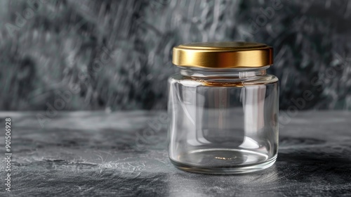 Transparent glass jar with gold lid