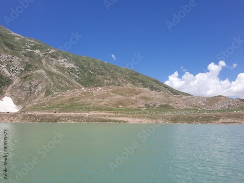 Beautiful daytime view of Saiful Malook Lake in Pakistan. Saiful Malook is a mountainous lake in northern Pakistan, located at the northern end of the Kaghan Valley, near the town of Naran.  photo