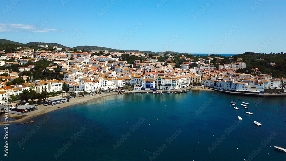 aerial view over the Badia de Cadaqués, to the old white houses of Cadaqués, Port Alguer and the Mediterranean Sea, Girona, Catalonia, Spain aerial view over the Badia de Cadaqués, to the old white houses of Cadaqués, Port Alguer and the Mediterranean Sea, Girona, Catalonia, Spain