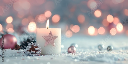 Candle With Star Decoration on Snowy Surface