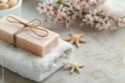 White Soap On Towels With Starfish And Flowers