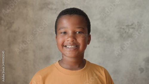 Portrait African American boy smiling and looking to camera