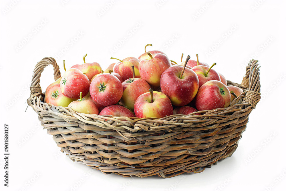 A wicker basket overflowing with red and yellow apples. A wicker basket overflowing with red and yellow apples.