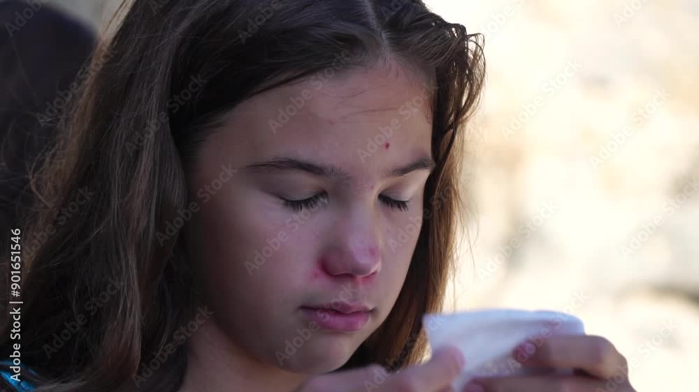 Young Girl with a Red Nose Blowing Her Nose Young Girl with a Red Nose Blowing Her Nose