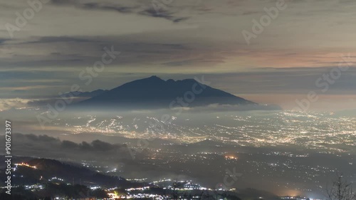 Mountain covered with clouds at night timlapse, Indonesia