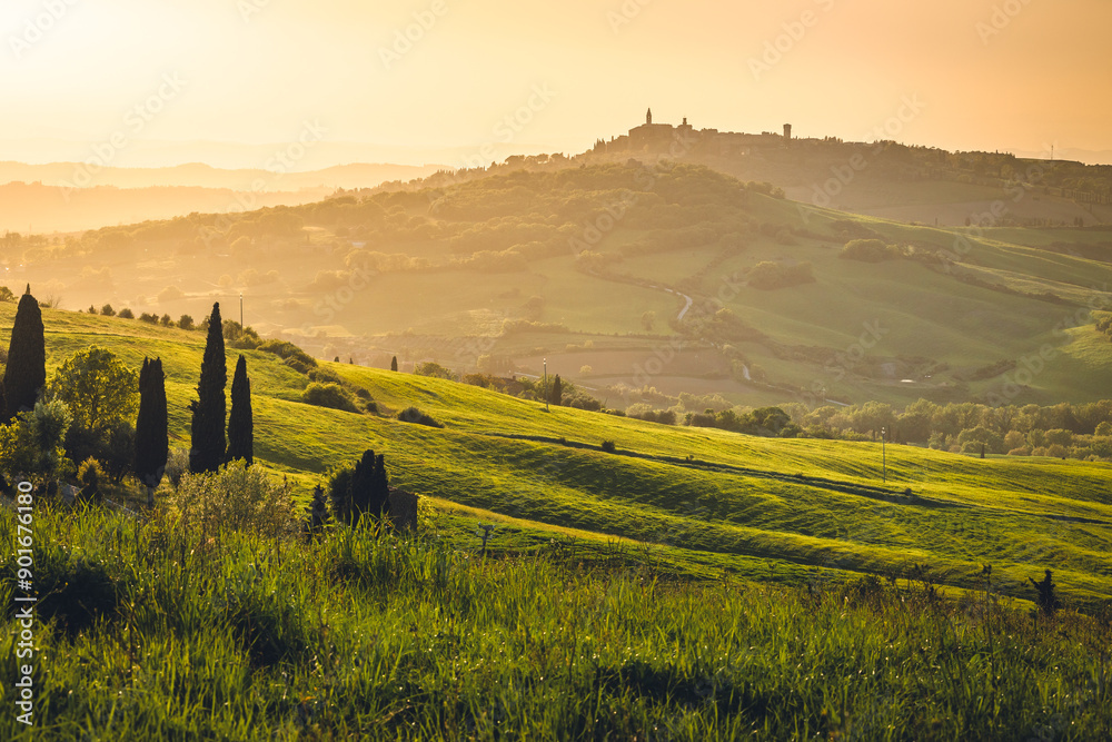 Spectacular landscapes of Val di Orcia in Tuscany, taken during sunset. Spring is the best time to visit this region.