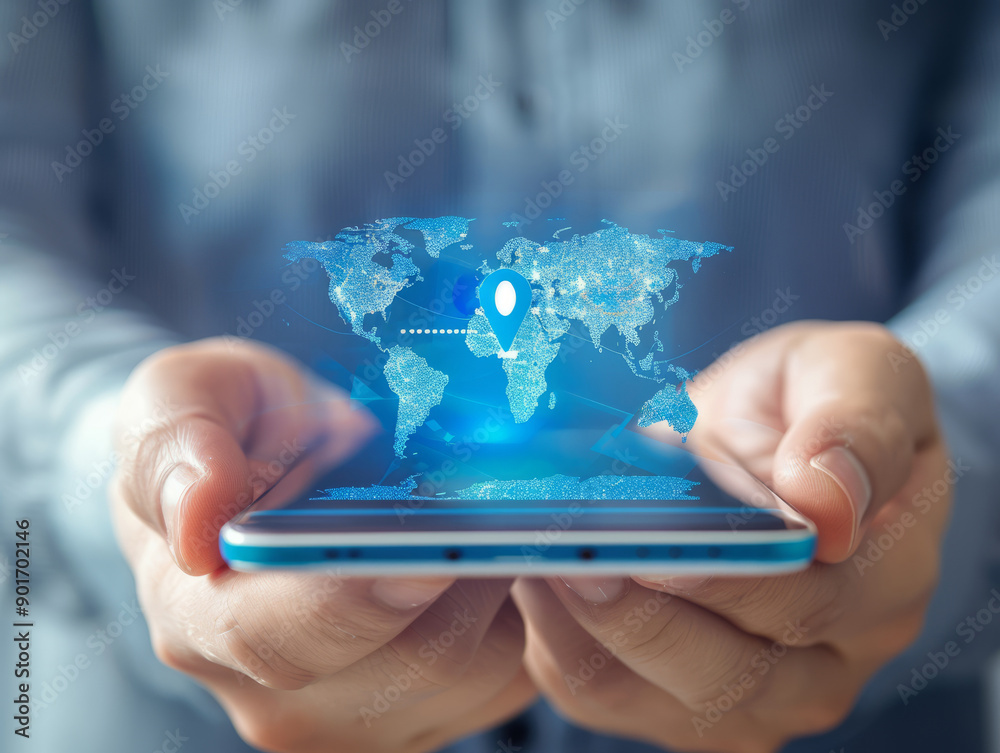 A hand holding a smartphone showing a world map with a blue location marker, emphasizing the concept of global connectivity and navigation A hand holding a smartphone showing a world map with a blue location marker, emphasizing the concept of global connectivity and navigation